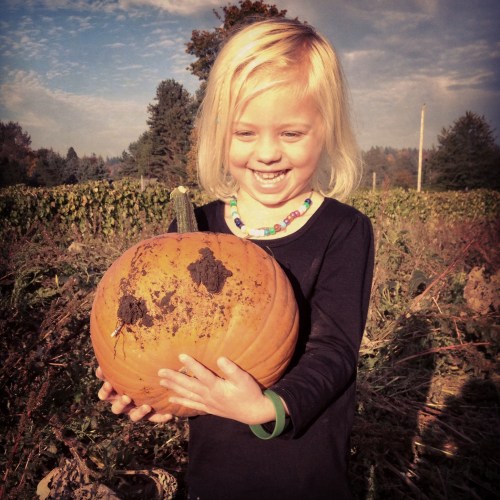 Lea is so happy about her pumpkin!